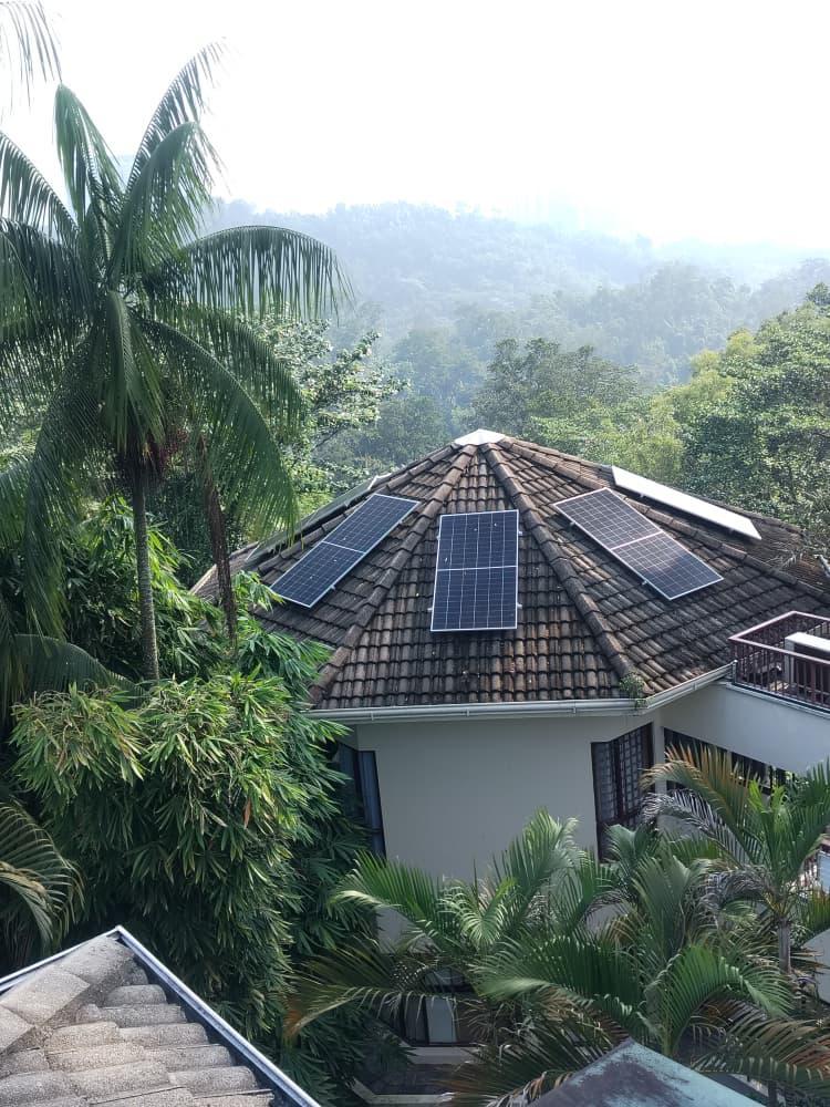 Solar panels on a hillside bungalow in Petaling Jaya