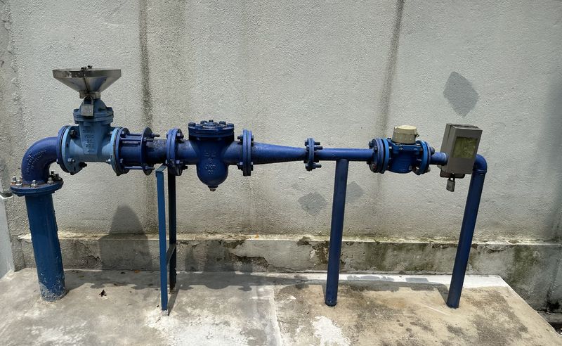 A typical commercial water meter pipe rack in Selangor, with the W-Valve install point marked just after the water meter
